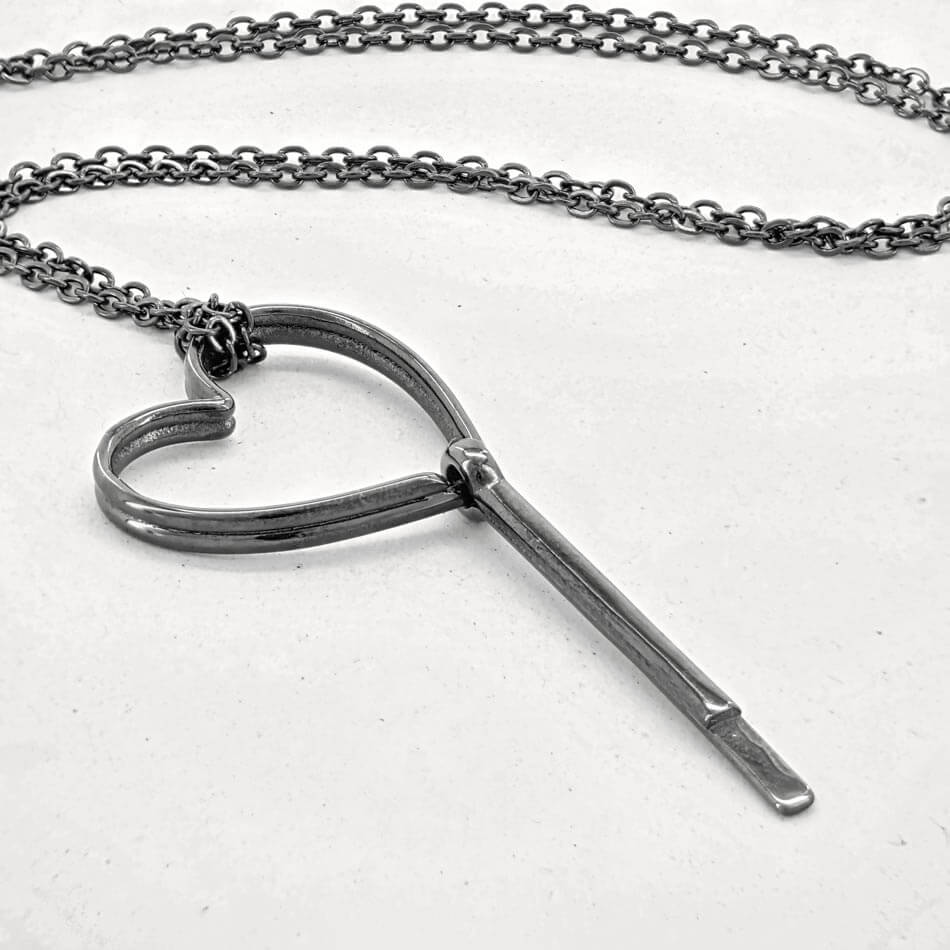 SUM of I Valerien Pin Necklace #color_black metal